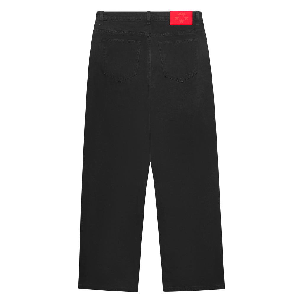Black distressed logo V3 denim jeans with a red branded leather back patch.