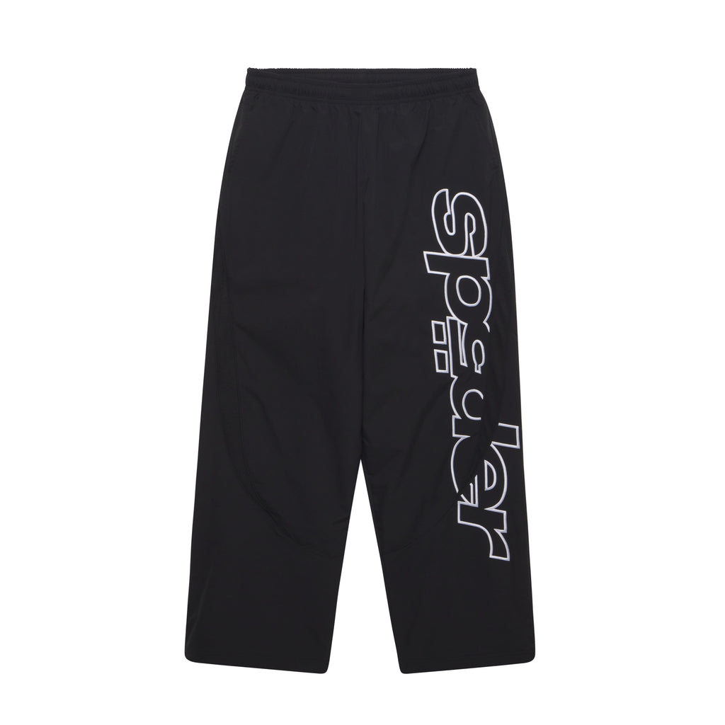 Black nylon wide-leg track pants with an elastic waistband, mesh side panels, and white embroidered graphic text.