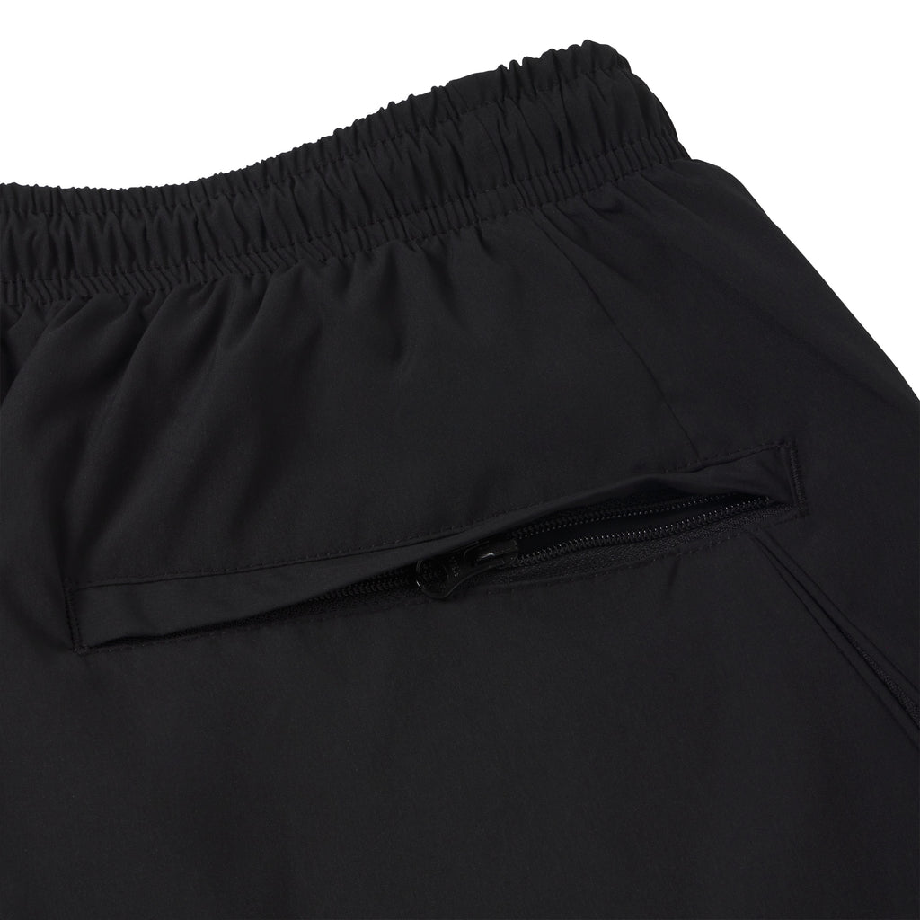 Black nylon track pant featuring an elastic waistband and a secure zippered side pocket.