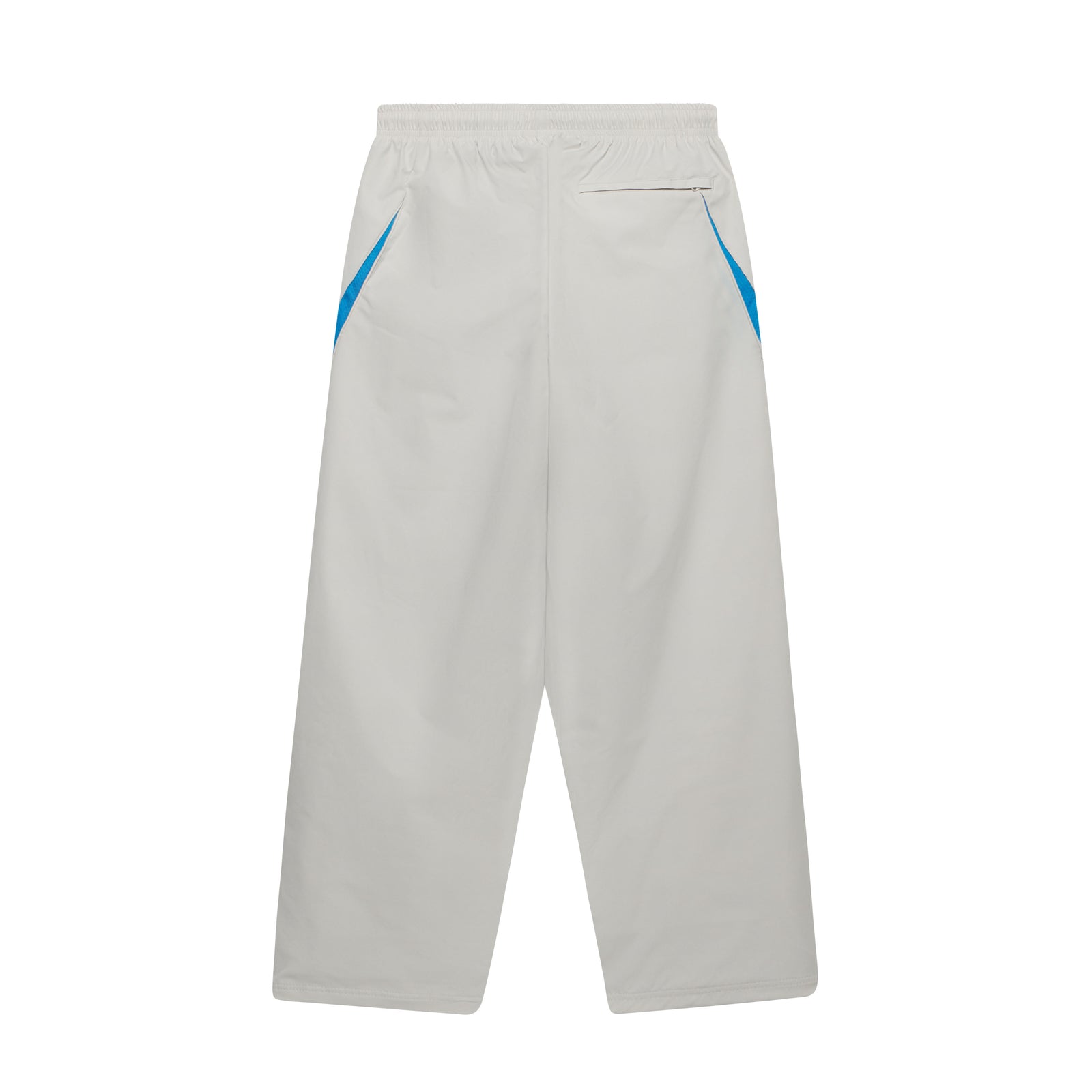 Beige nylon wide-leg track pants featuring blue contrast side panels, an elastic waistband, and a back zip pocket.
