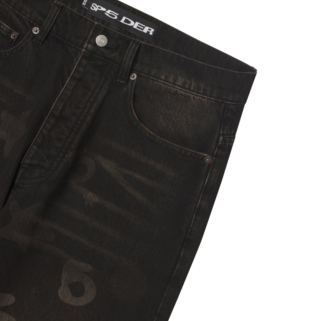 Black straight-leg denim pants featuring a faded Beluga graphic print, custom branded hardware, and a SP5DER waist label.