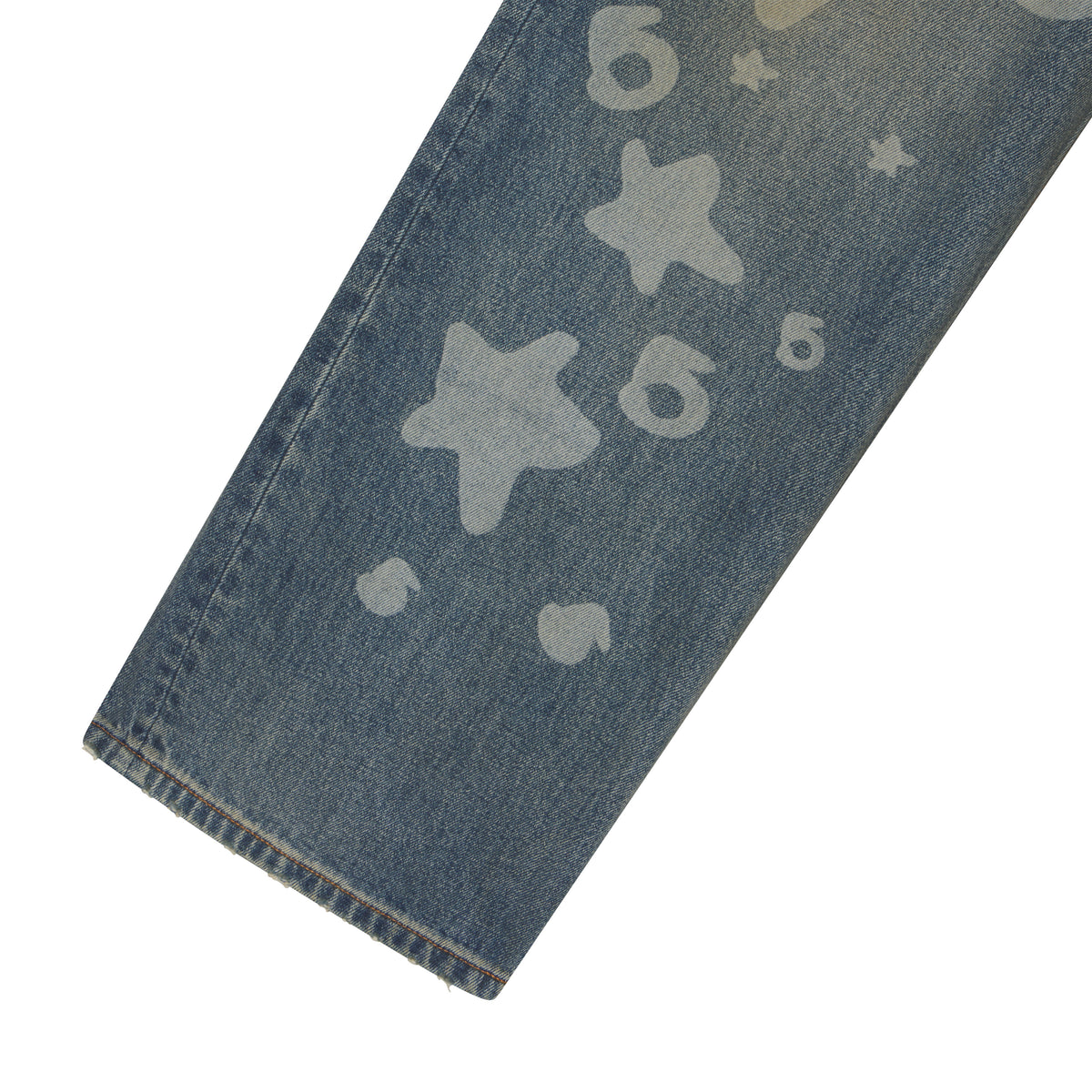 Straight-leg blue denim jeans featuring a faded white Beluga graphic print of stars and numbers.