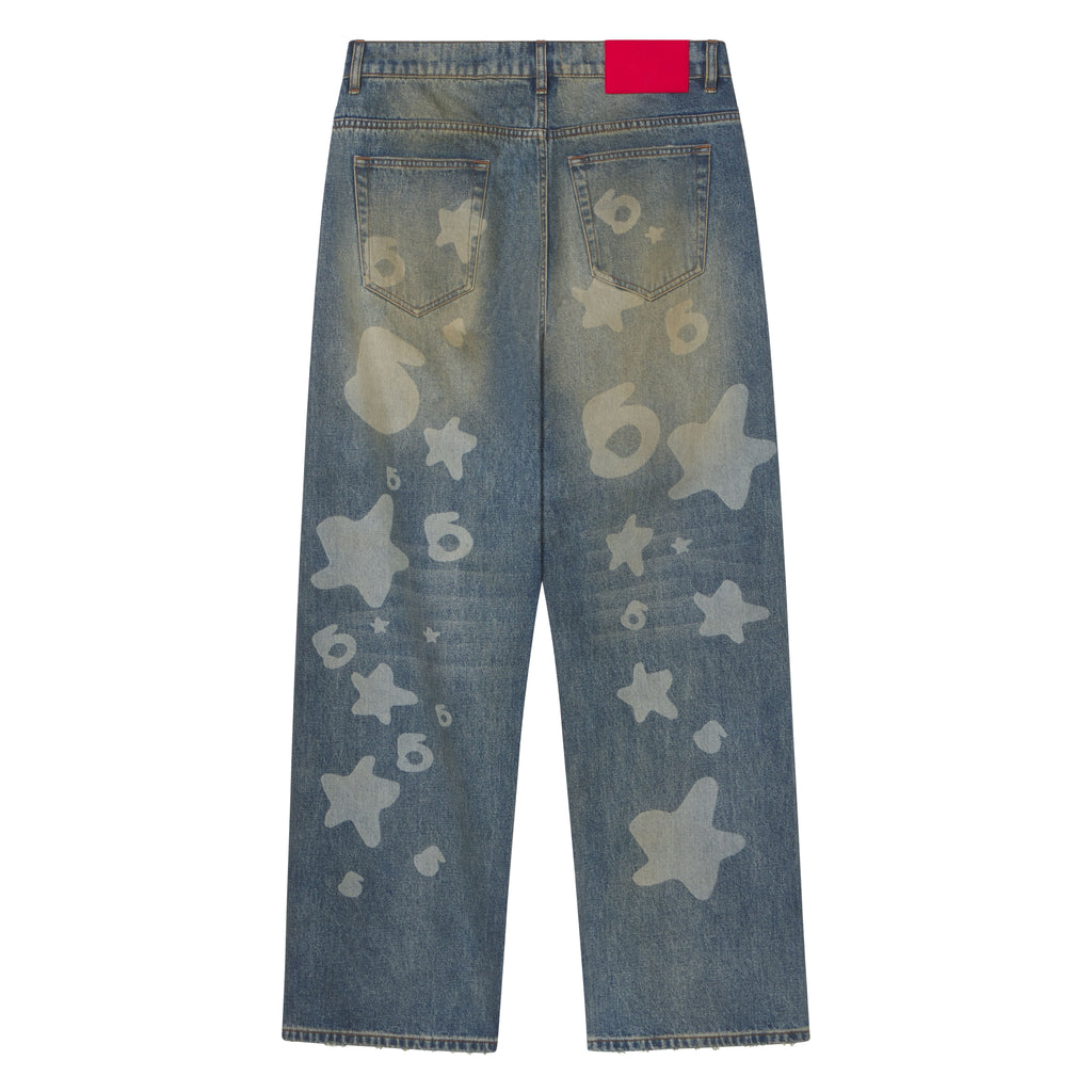 Straight-leg blue denim jeans with a faded Beluga graphic print, five-pocket styling, and a red branded leather back patch.