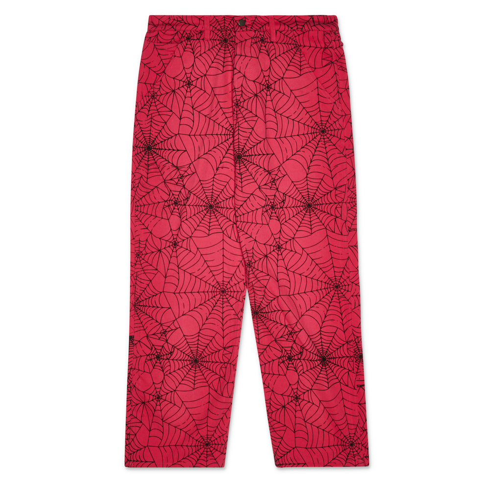 Pink denim work pants with an all-over black spider web print.
