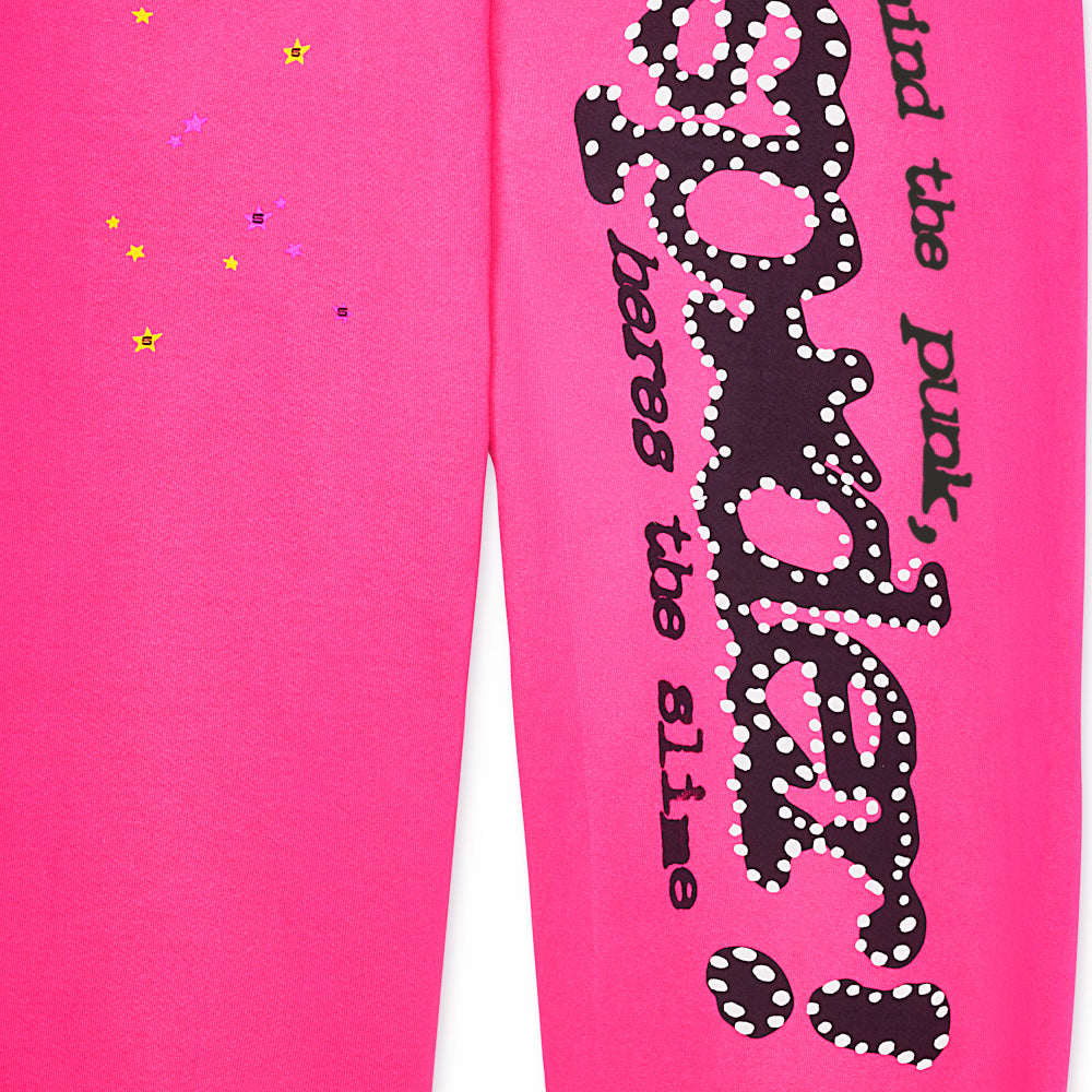 Pink 23oz fleece sweatpants with black puff print "SP5DER" motif and star prints.