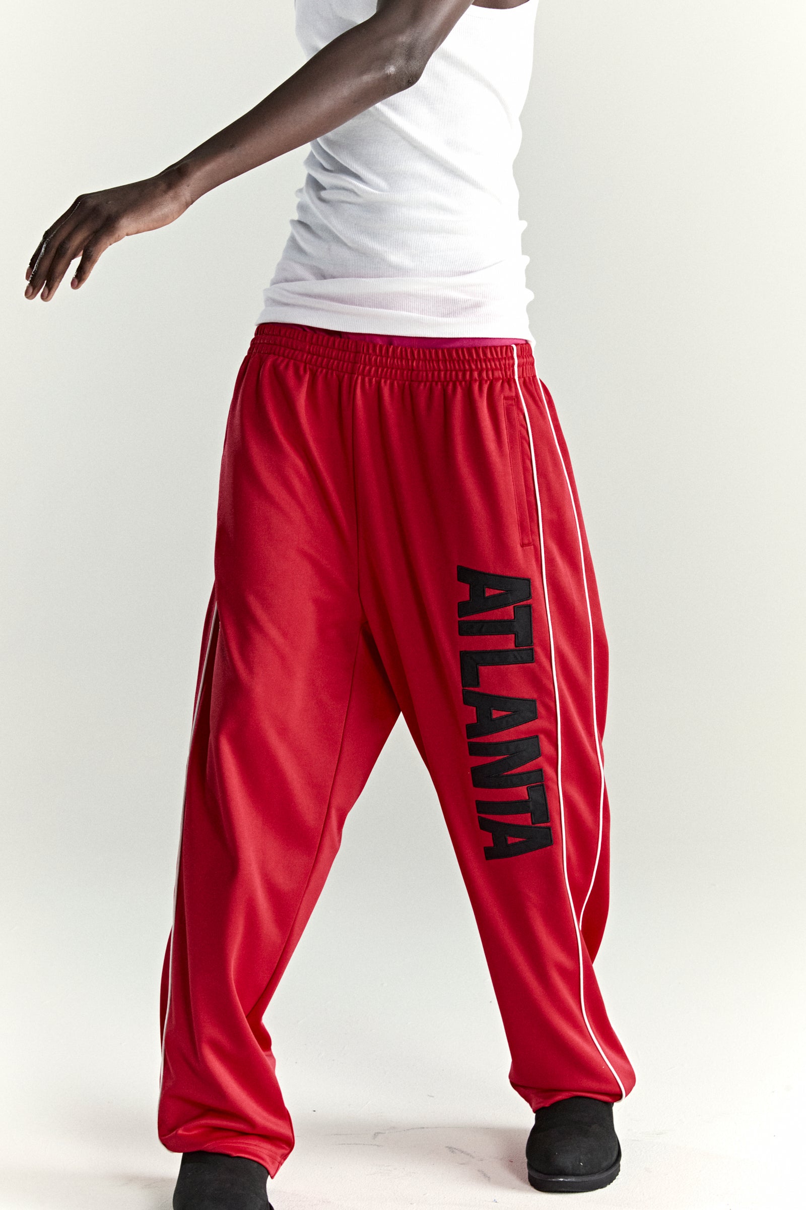 RED ATLANTA TRACK PANT ON MODEL