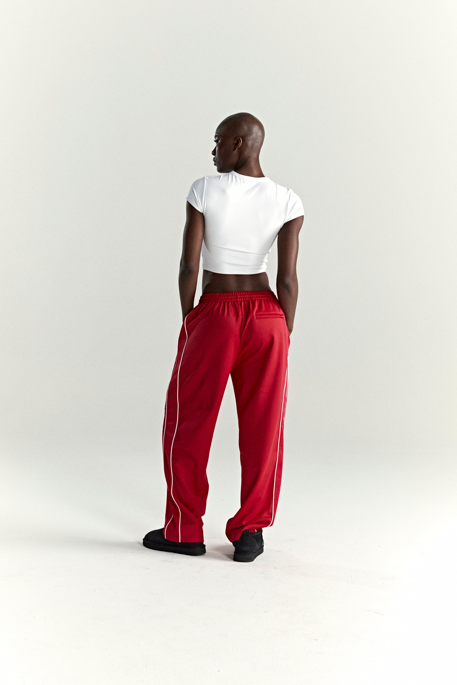 RED ATLANTA TRACK PANT ON MODEL