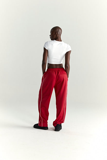 RED ATLANTA TRACK PANT ON MODEL