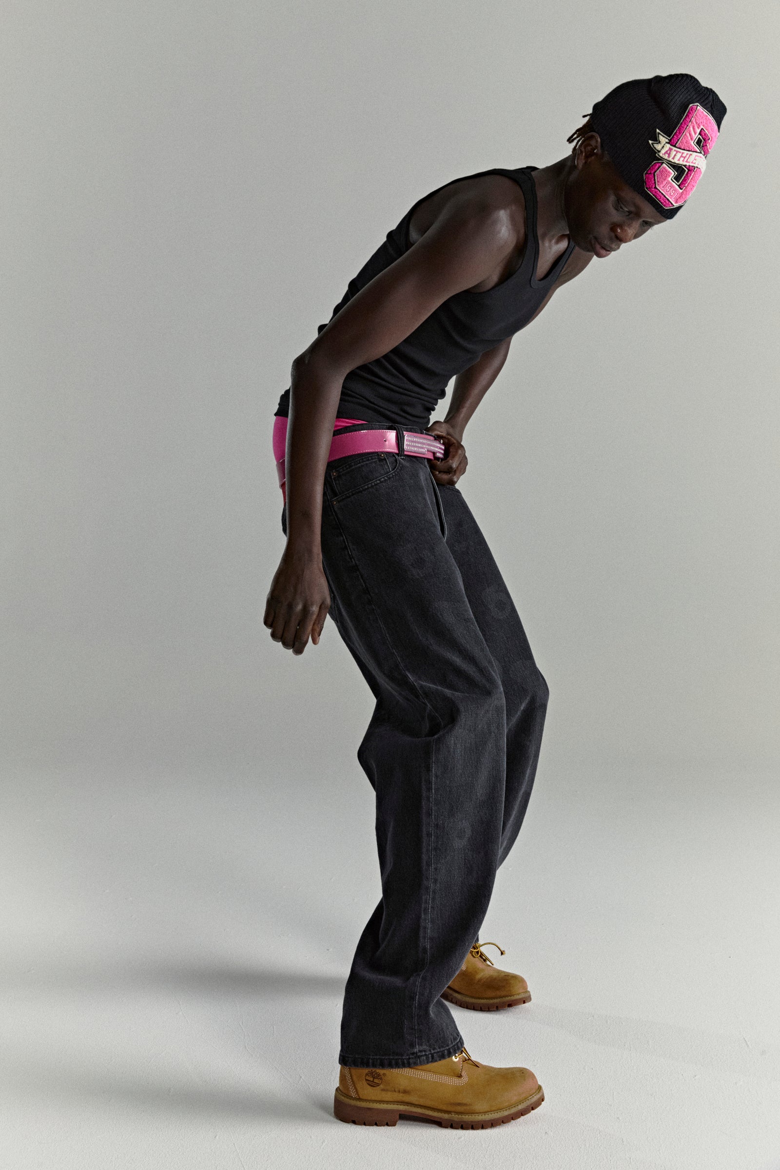 BELUGA DENIM faded wash, straight leg jeans with branded hardware and leather back patch.