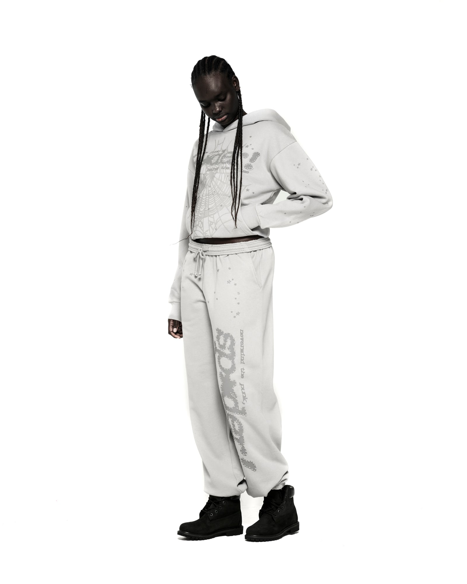 Light gray cotton fleece hoodie with P*NK SP5DER web puff print, scattered stars, and matching sweatpants.