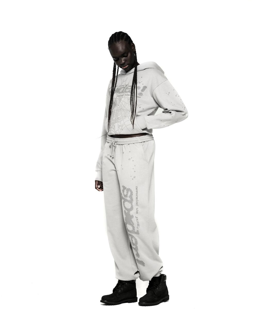 Light gray cotton fleece hoodie with P*NK SP5DER web puff print, scattered stars, and matching sweatpants.
