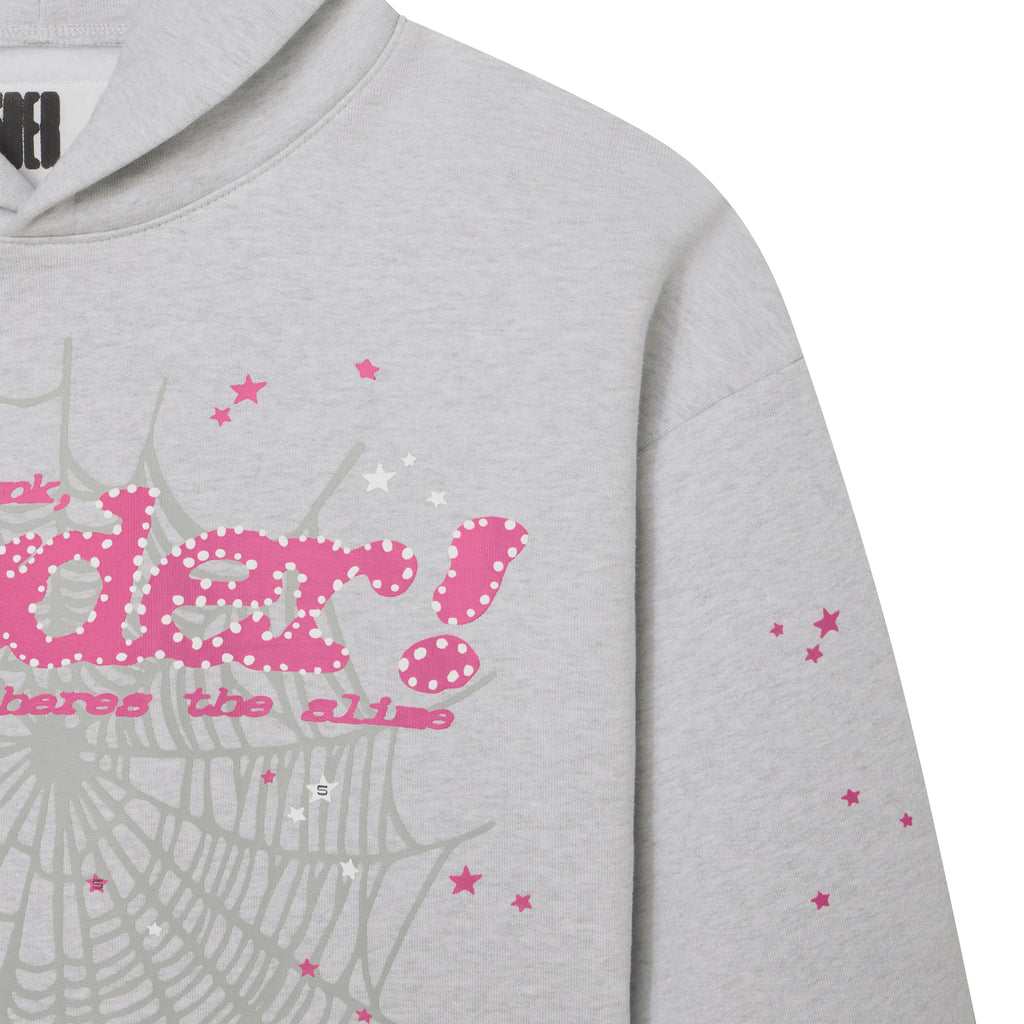 Grey 100% cotton fleece hoodie featuring a pink puff print SP5DER web graphic and scattered star designs.