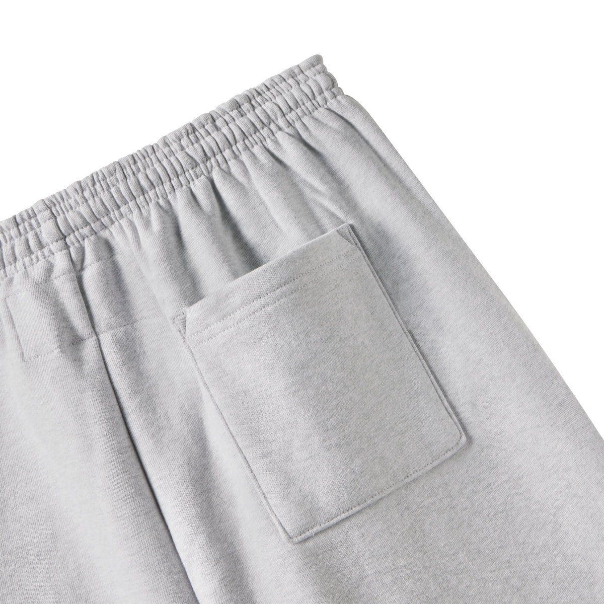 Light grey 13oz cotton fleece sweatpants featuring an elasticized waistband and a rear patch pocket.