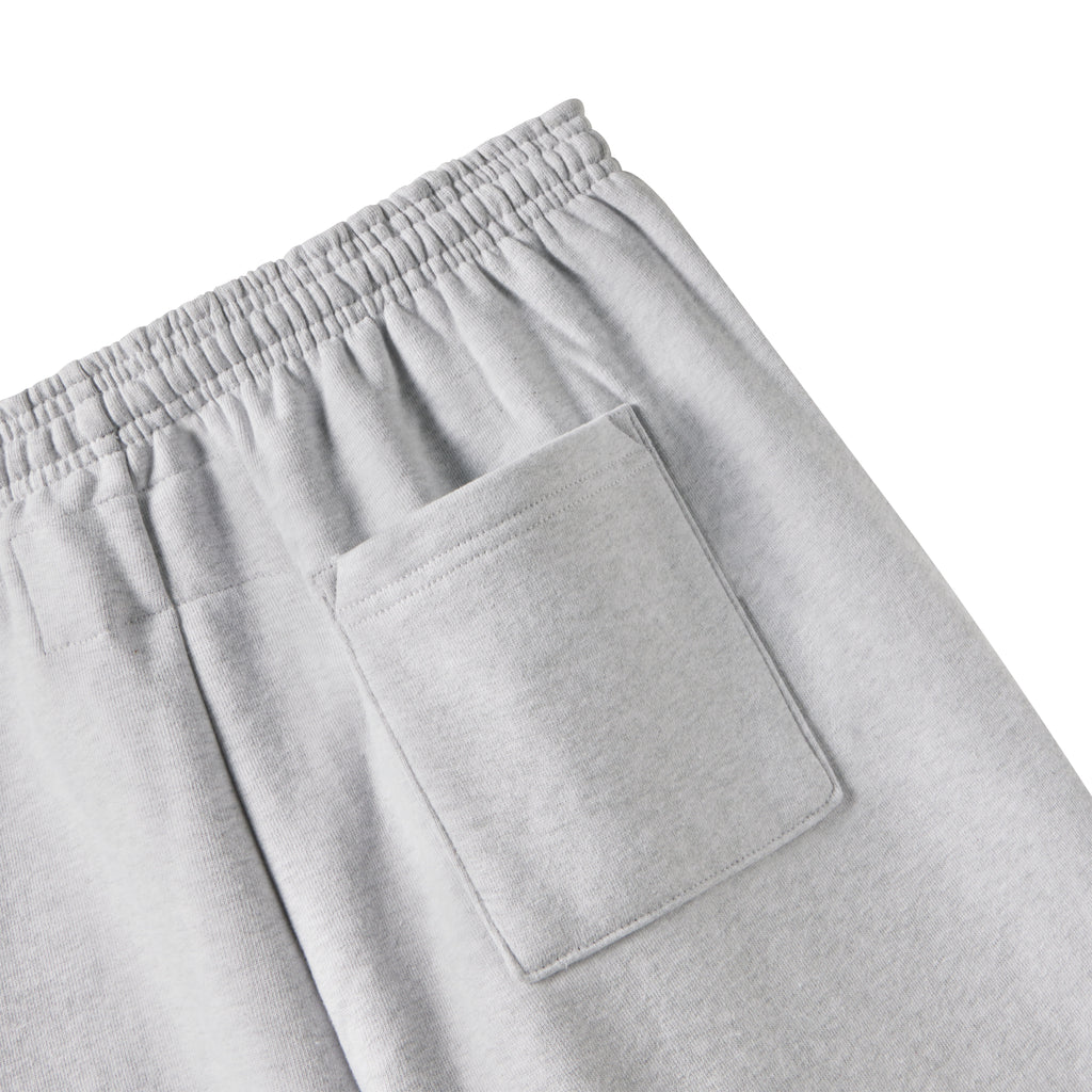 Light grey 13oz cotton fleece sweatpants featuring an elasticized waistband and a rear patch pocket.