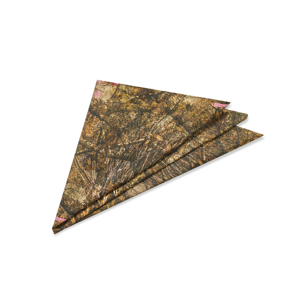 Folded SP5DER Real Tree camo cotton gauze bandana with subtle red accents.