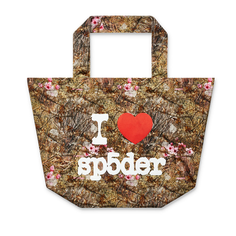 XL tote bag in real tree camo print with "I ❤️ sp5der" in white and red.