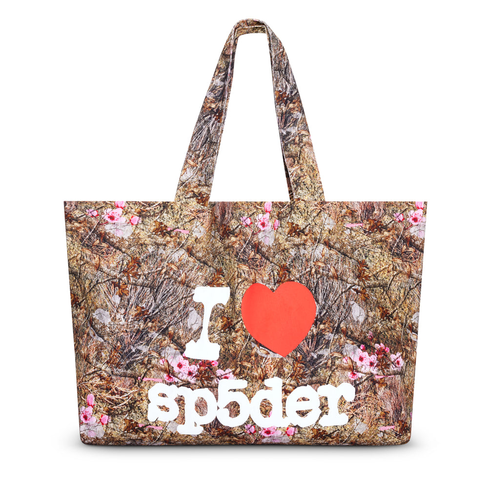 XL Real Tree camo tote bag with pink floral accents and "I ❤️ sp5der" in white text.