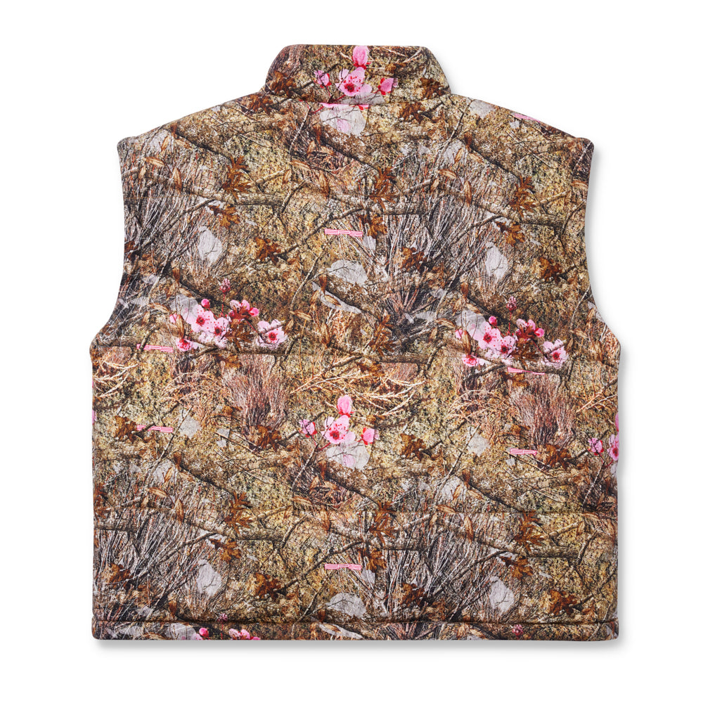 Real Tree Puffer Vest with custom SP5DER logo, zip closure, and quilted interior.