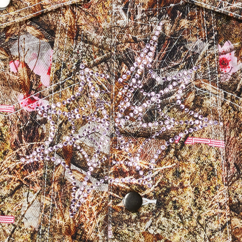 Real Tree camo trucker jacket with pink rhinestone web design and silver button.
