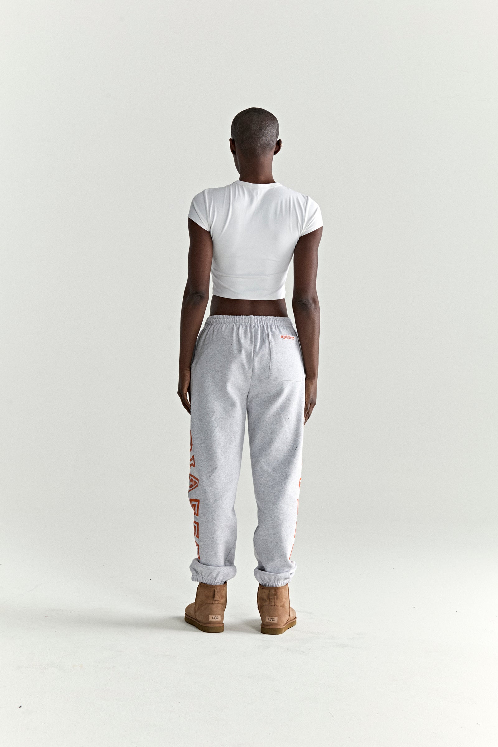 Gray ARACH SWEATPANT with arched orange text, 13oz cotton fleece, elasticized cuffs.