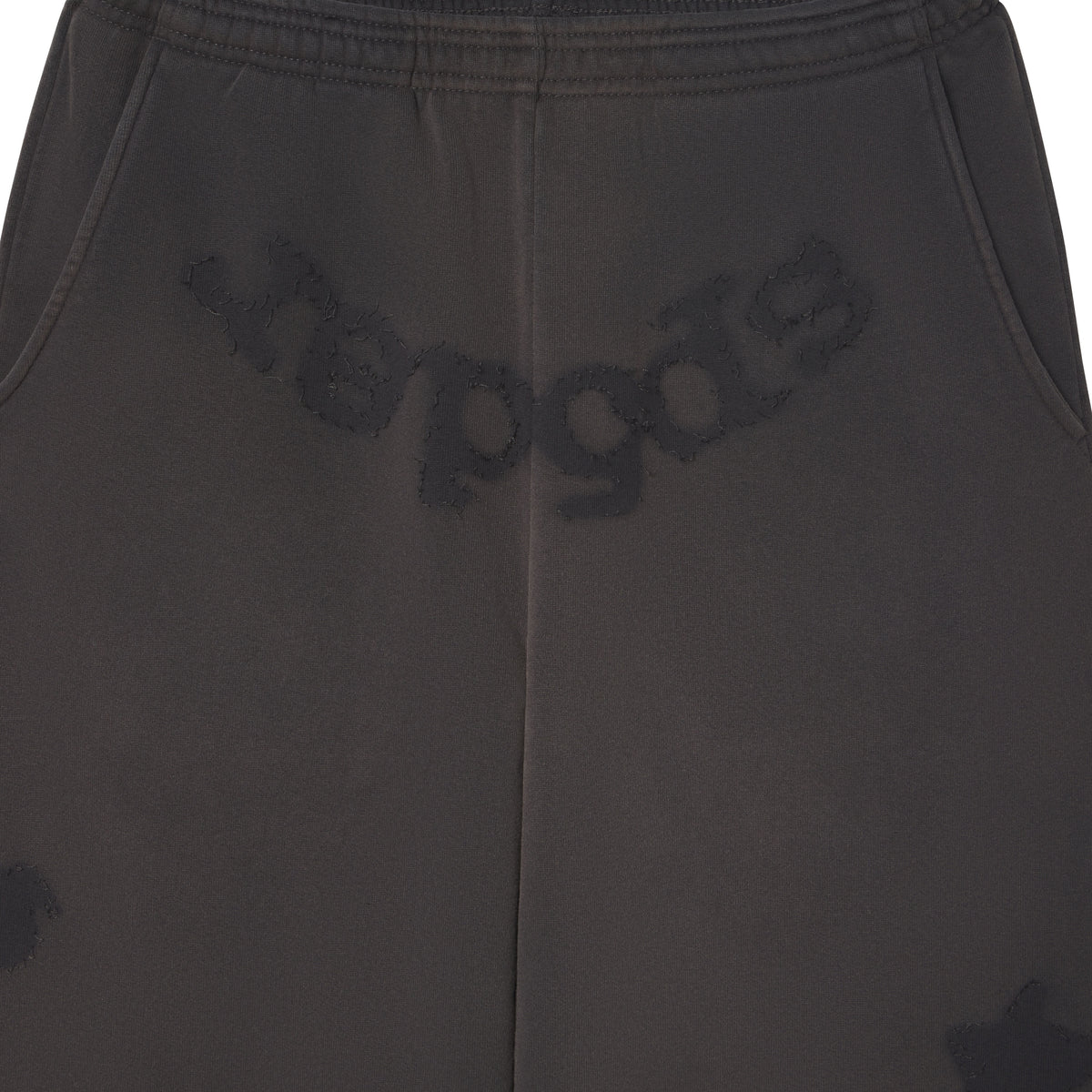 Beluga grey cotton fleece sweatpants featuring distressed SP5DER graphic print at the crotch and star design details.