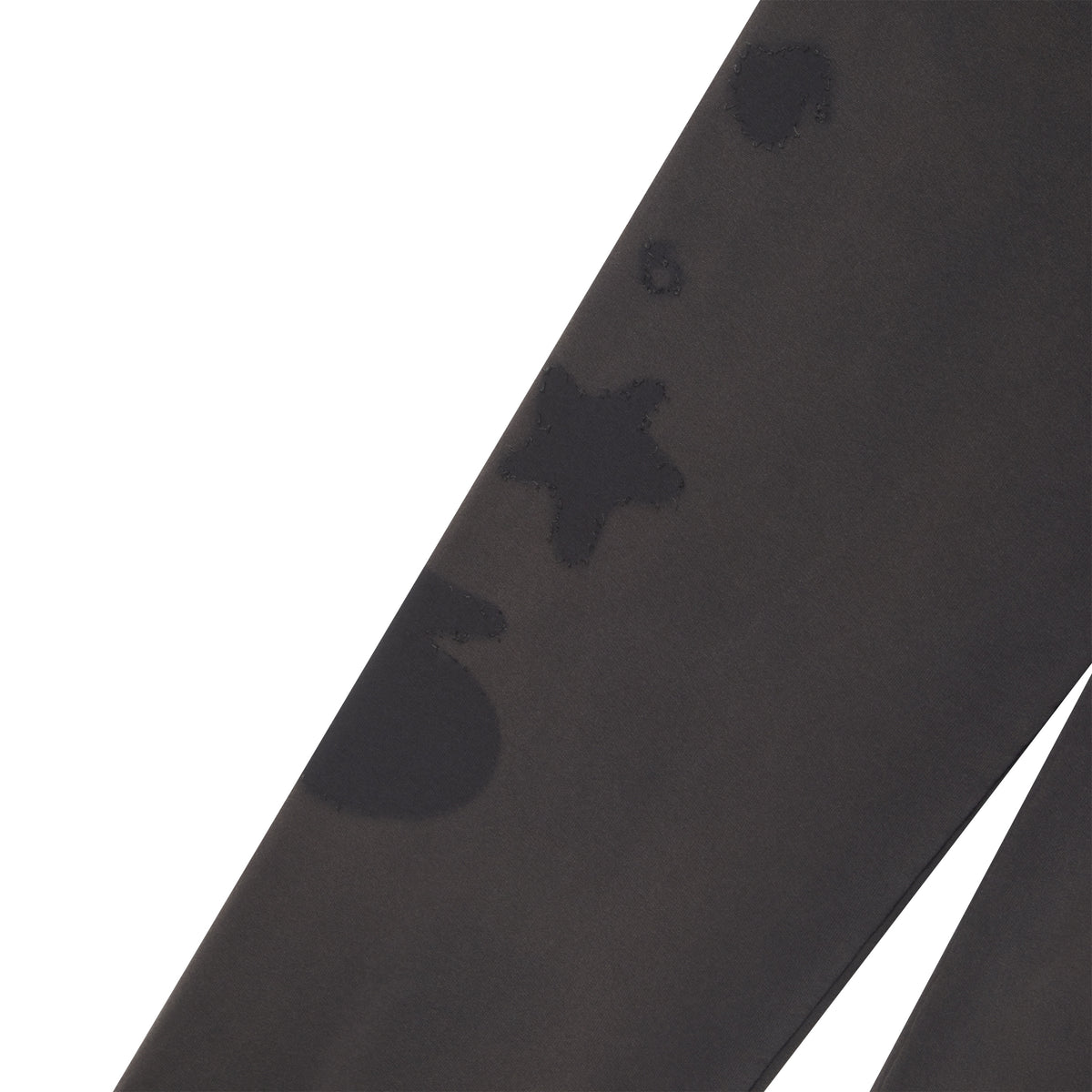 Grey cotton fleece sweatpants featuring a distressed graphic print of a number five and a star on the leg.