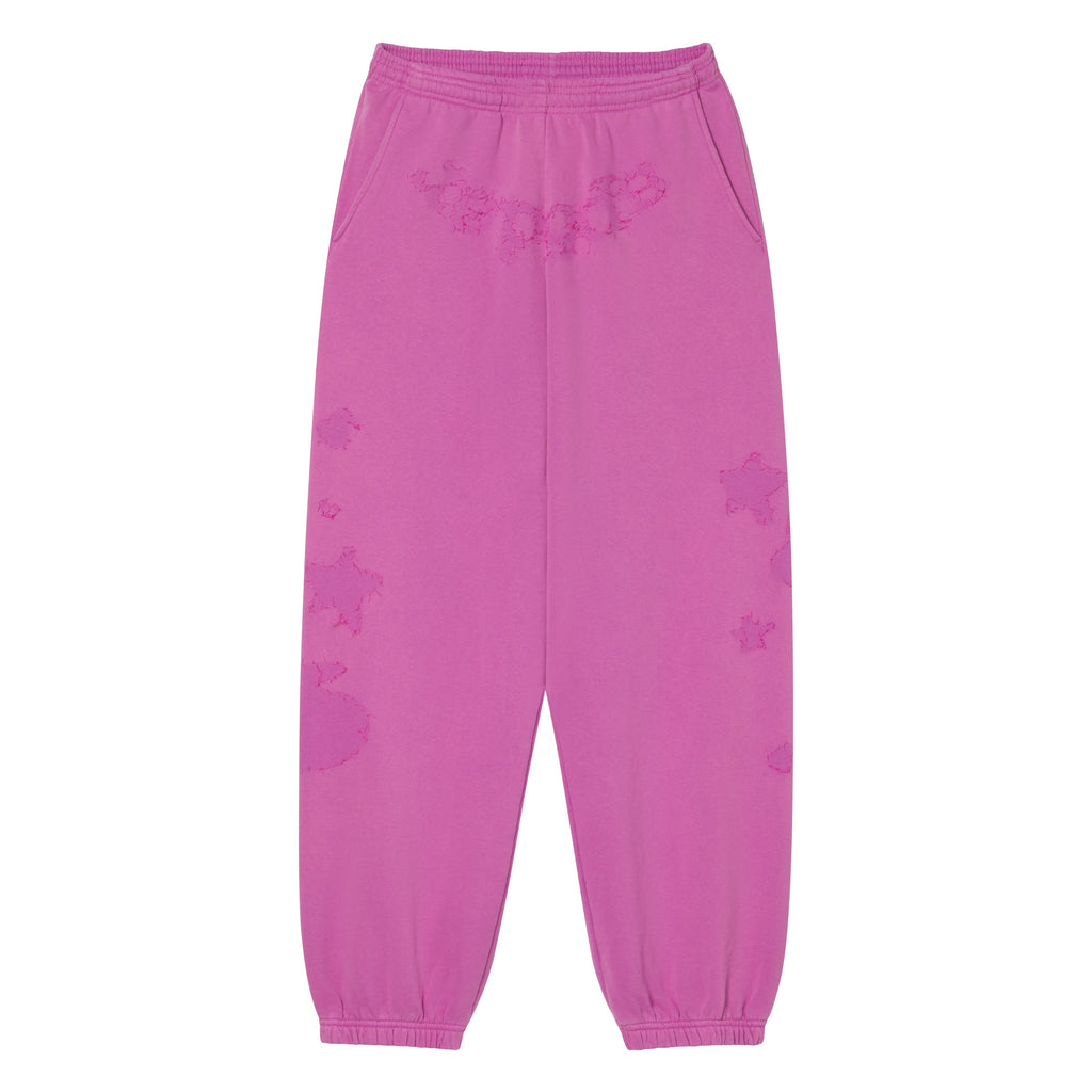 Pink cotton fleece sweatpants with distressed SP5DER graphic print, elasticized waistband, and cuffed ankles.