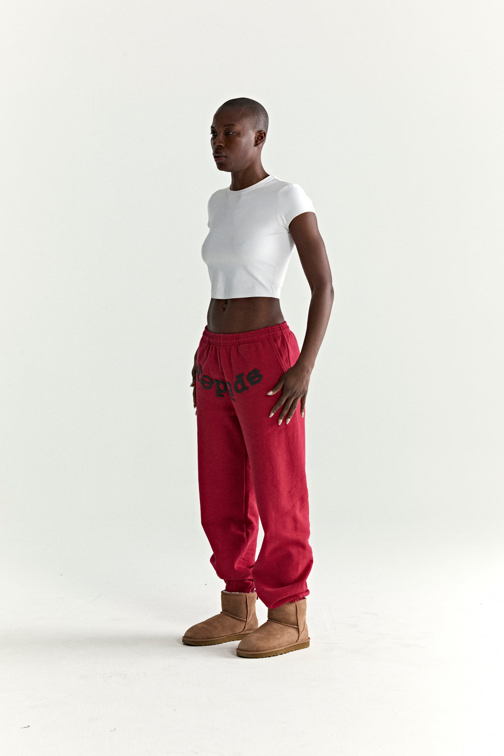RED OG WEB V2 SWEATPANT ON MODEL