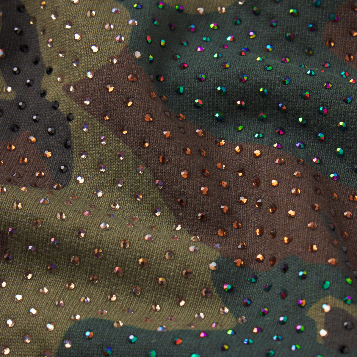 Camo print cotton fleece sweatpants featuring an all-over tonal rhinestone graphic design.