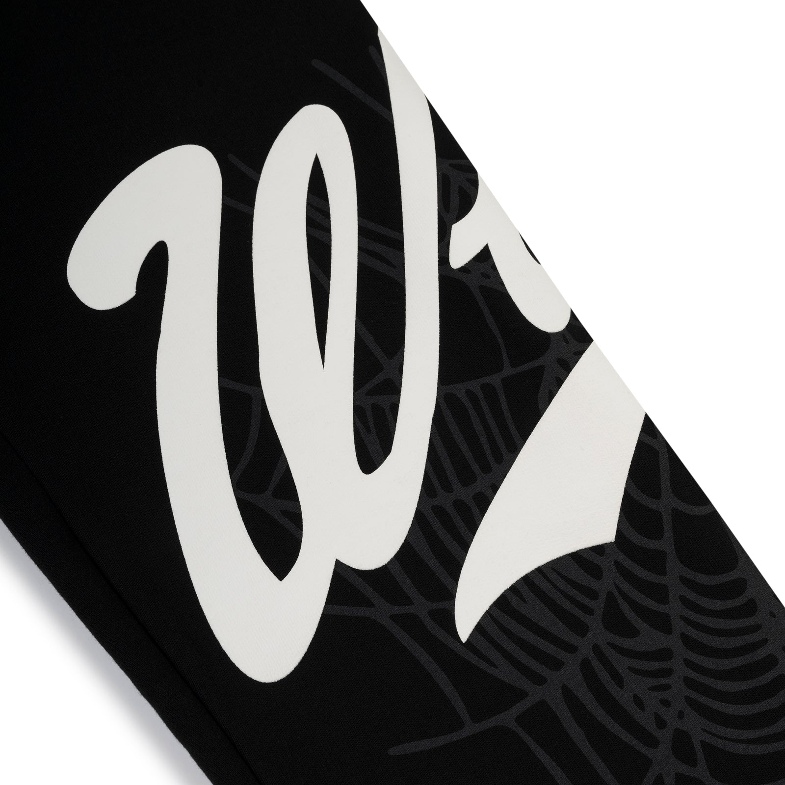 Black cotton fleece sweatpant with white "Wait" script and subtle spiderweb print.
