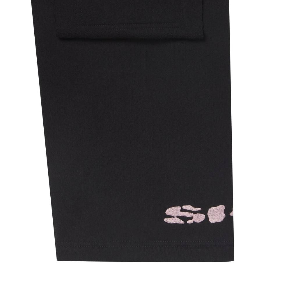 Black cotton fleece wide-leg sweatpants featuring a distressed pink graphic print and an oversized front pocket.