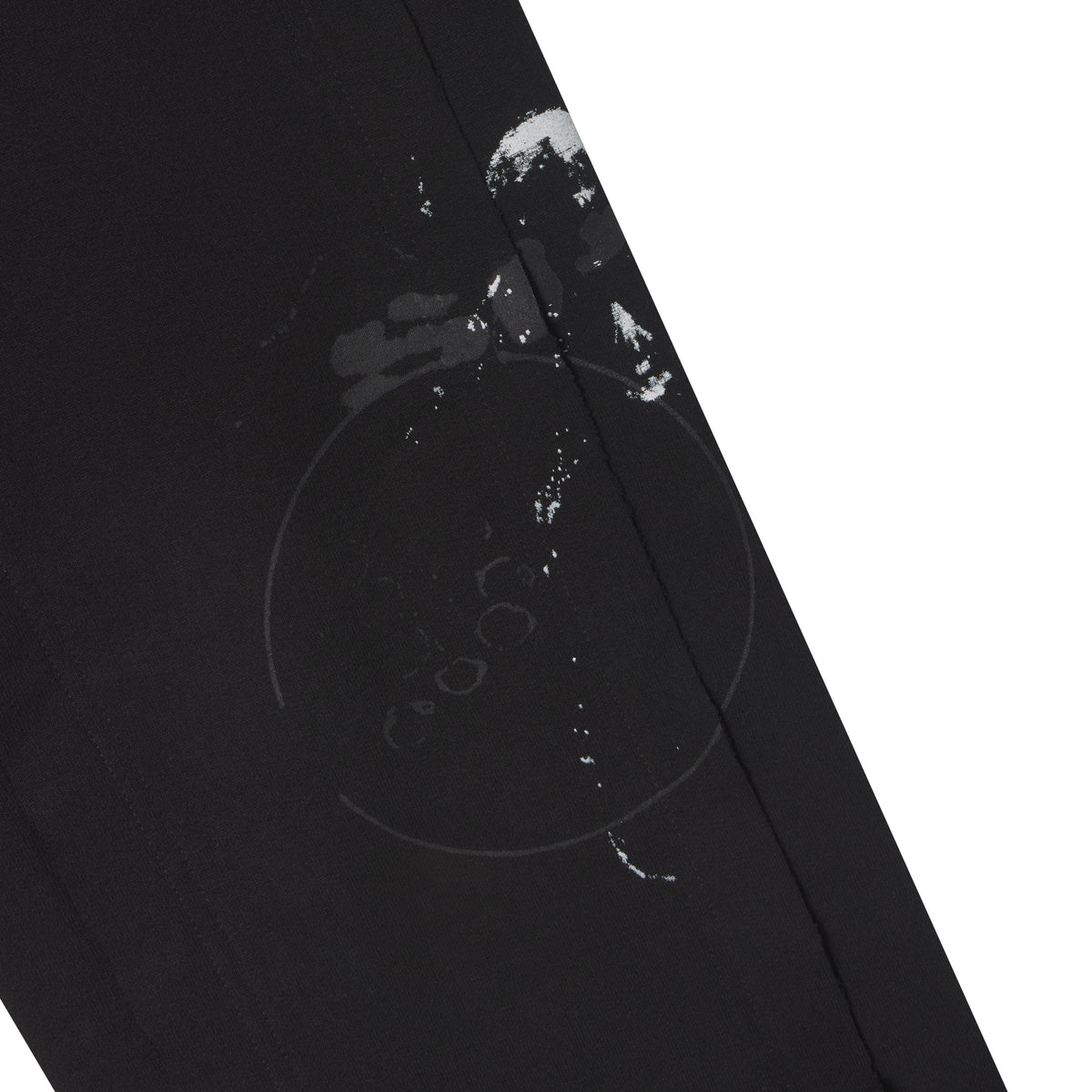 Black cotton fleece sweatpants featuring distressed white abstract graphic prints and subtle circular line designs.