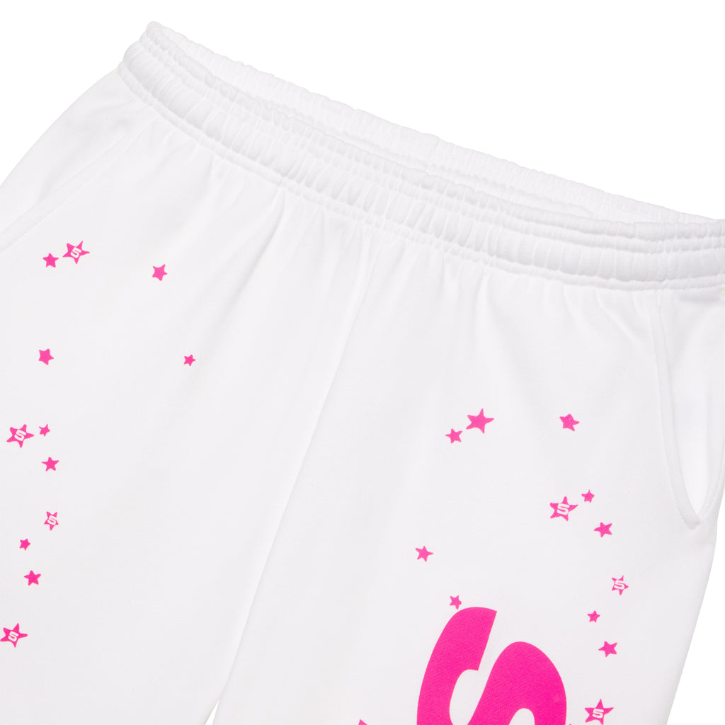 White french terry wide leg sweatpants with pink fractured logo and scattered star print.