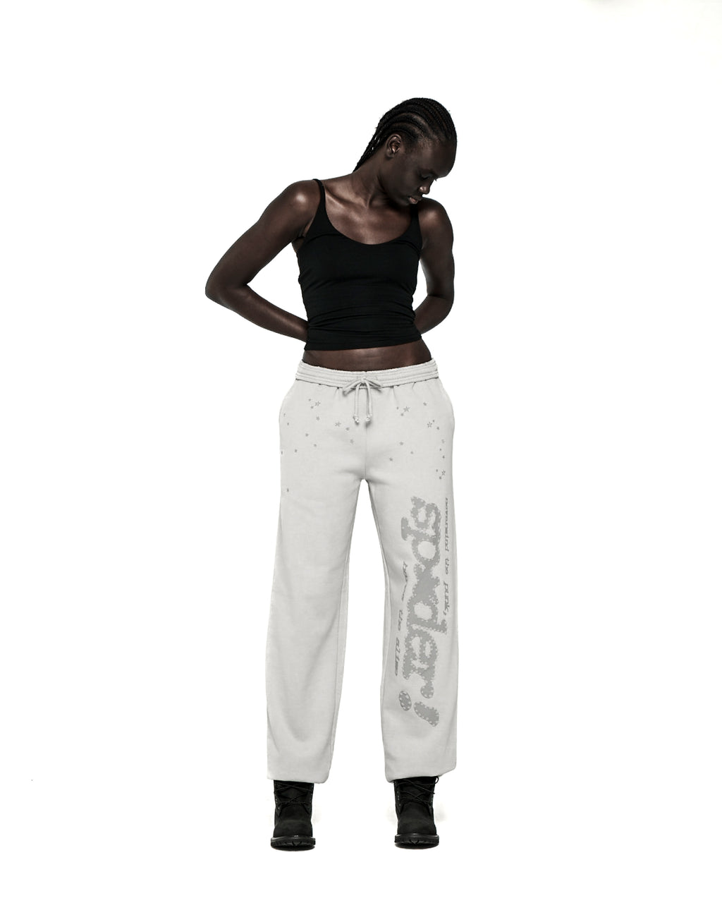 Light grey cotton fleece sweatpants with "SP5DER" text and scattered star print.