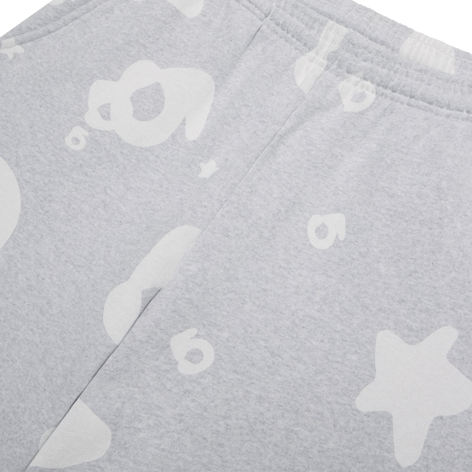 Close-up of gray Beluga V2 sweatpants with white all-over puff print design.