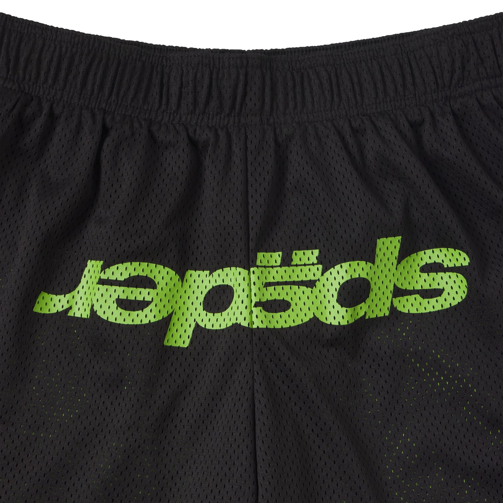 Black breathable mesh shorts with a green graphic print logo and an elasticized waistband.