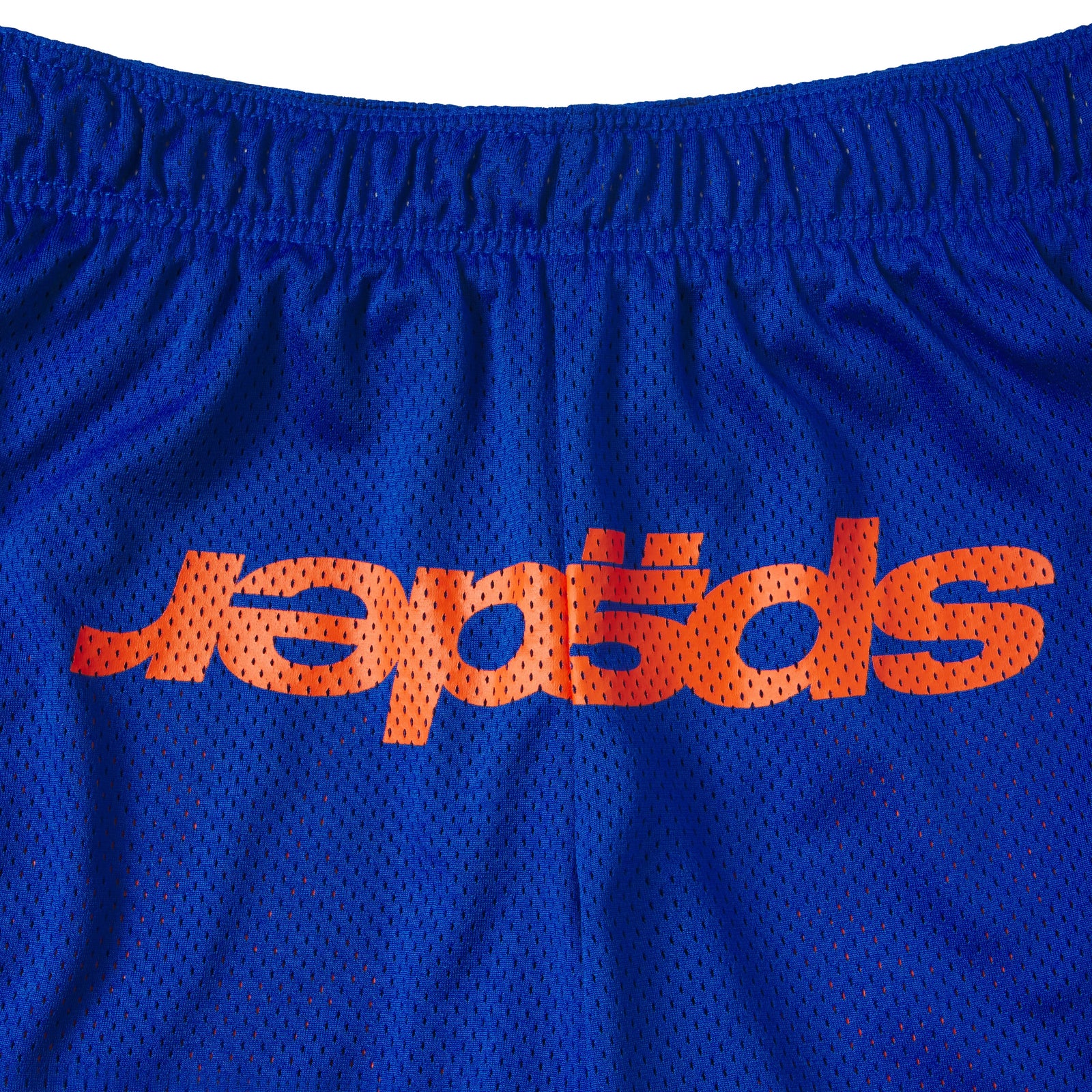 Blue breathable mesh shorts with an elasticized waistband and orange graphic text print on the front.