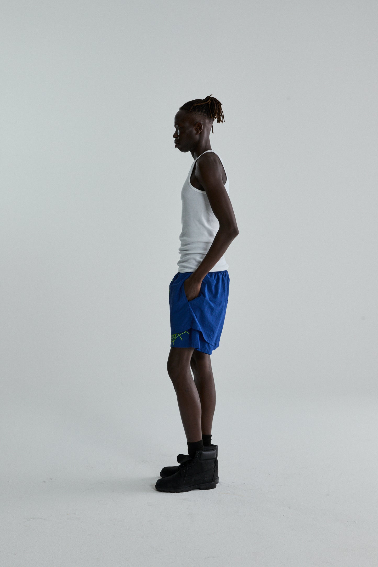 BLUE OG WEB DOUBLE LAYER SHORTS ON MODEL