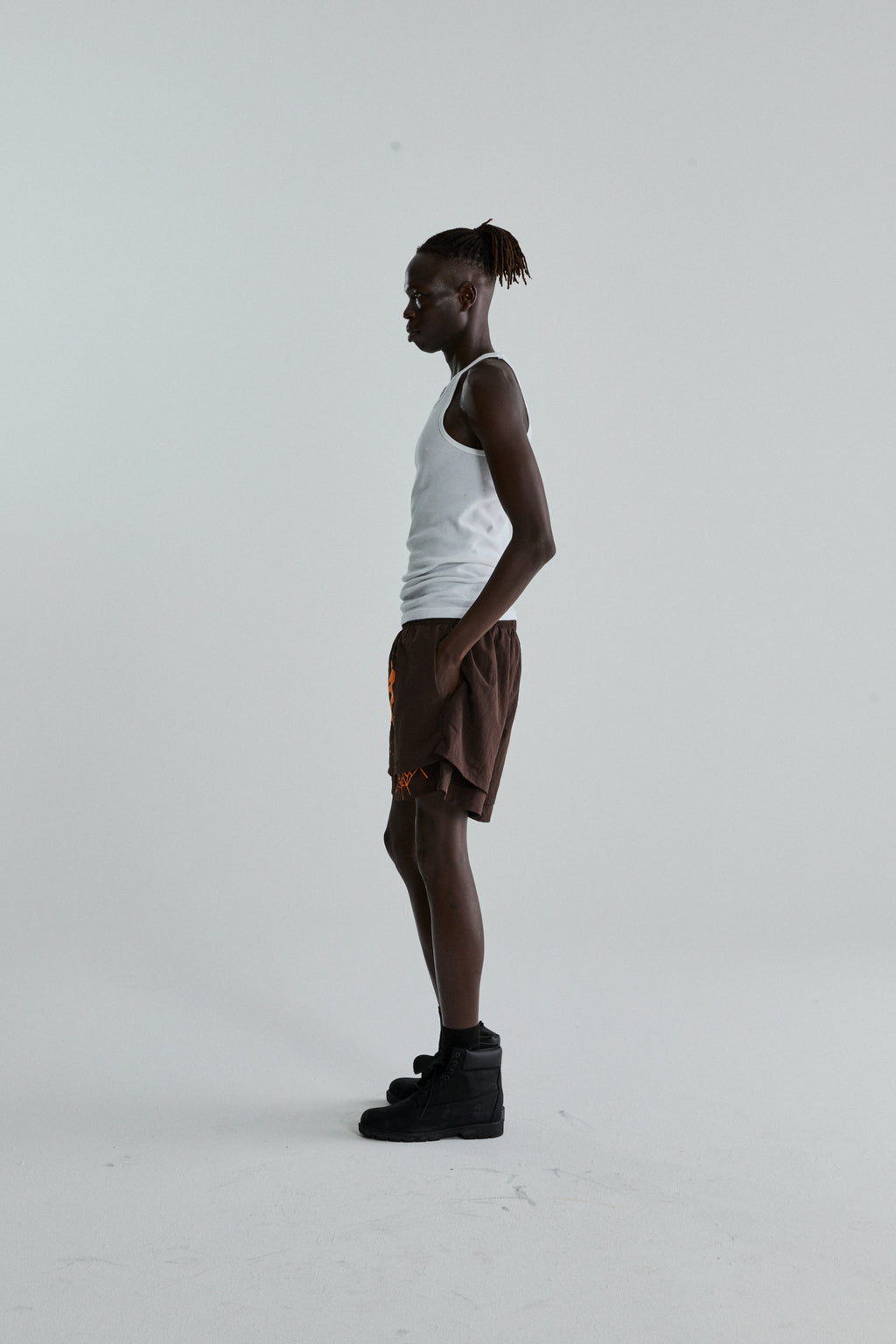 BROWN OG WEB DOUBLE LAYER SHORTS ON MODEL