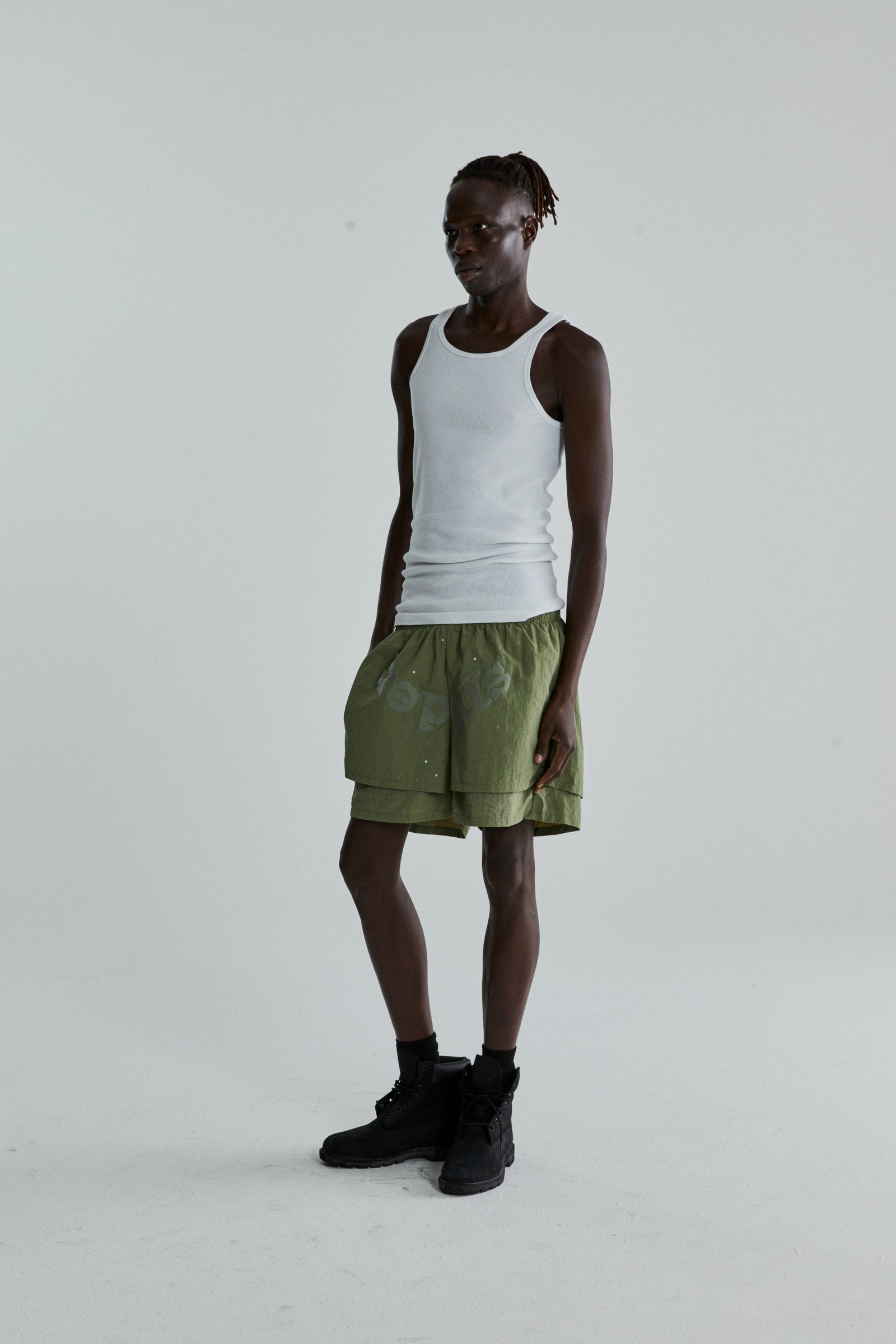 SAGE GREEN OG WEB DOUBLE LAYER SHORTS ON MODEL