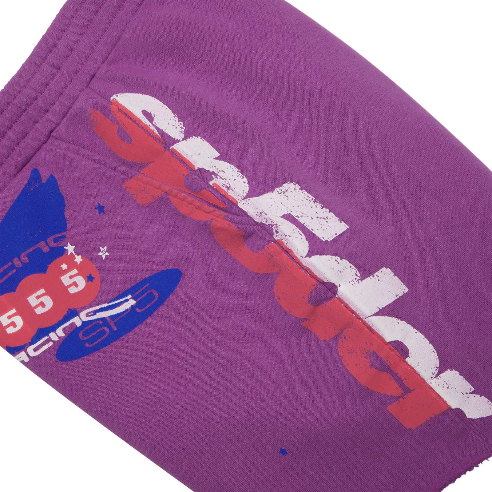 Purple cotton fleece sweatshorts with white, red, and blue graphic print, drawcord waistband, and raw hem.