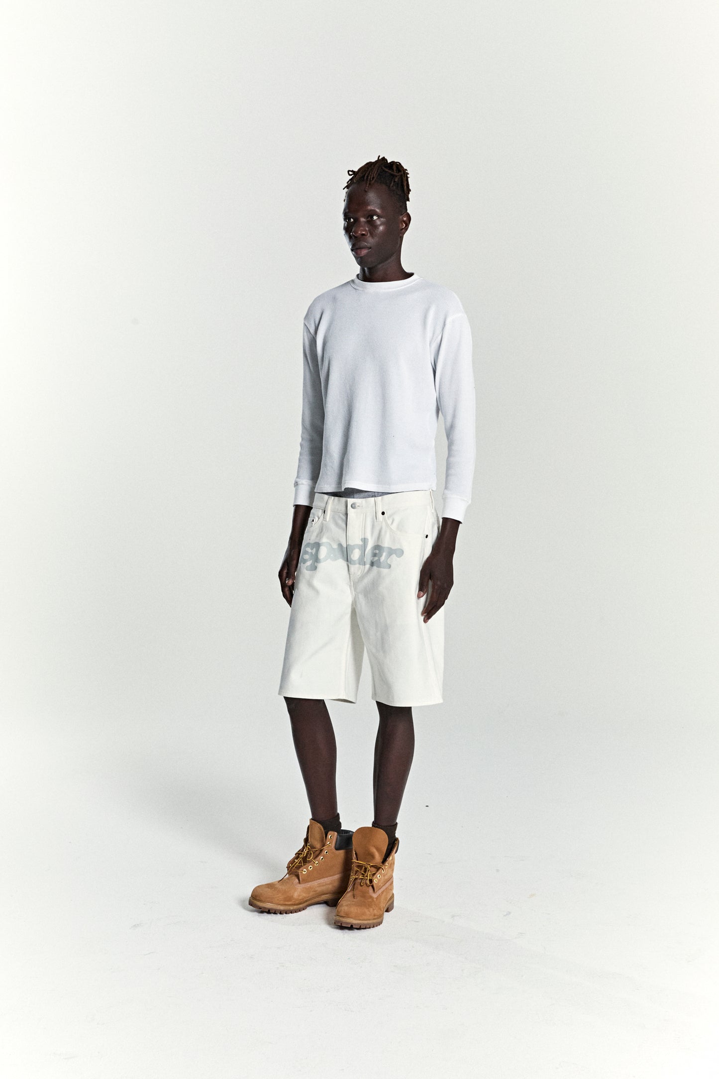 WHITE V3 LOGO DENIM SHORT ON MODEL