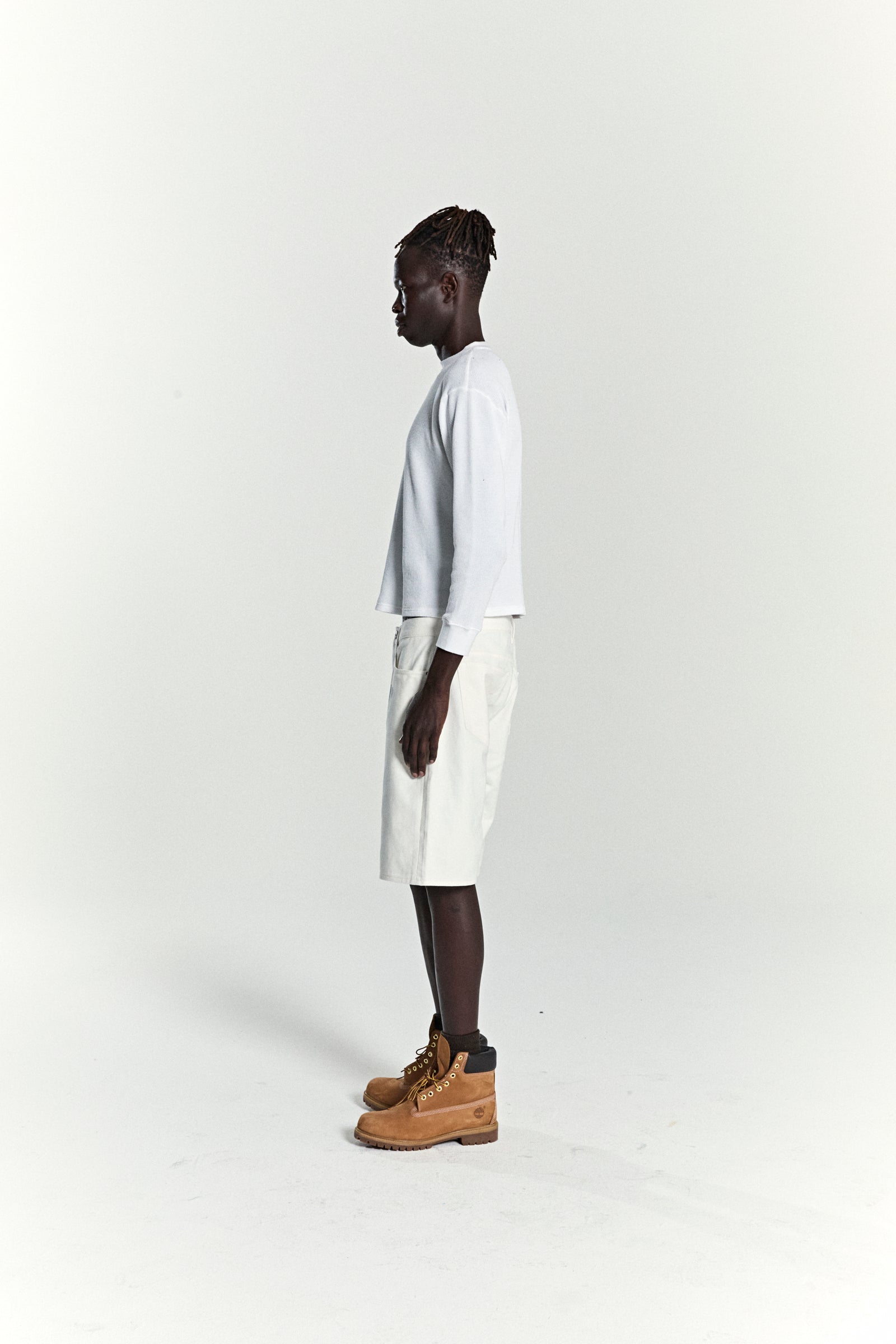 WHITE V3 LOGO DENIM SHORT ON MODEL