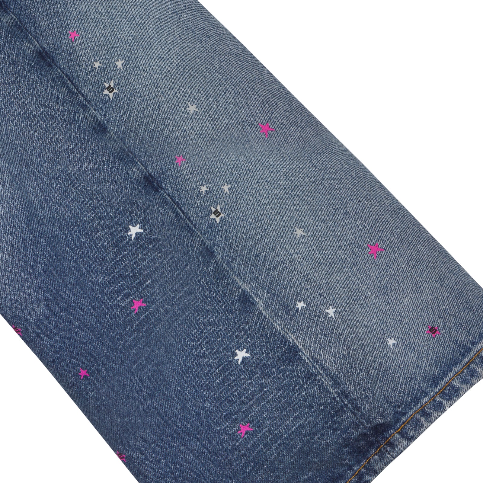 Blue denim shorts with scattered pink and white star print, heavy web design.