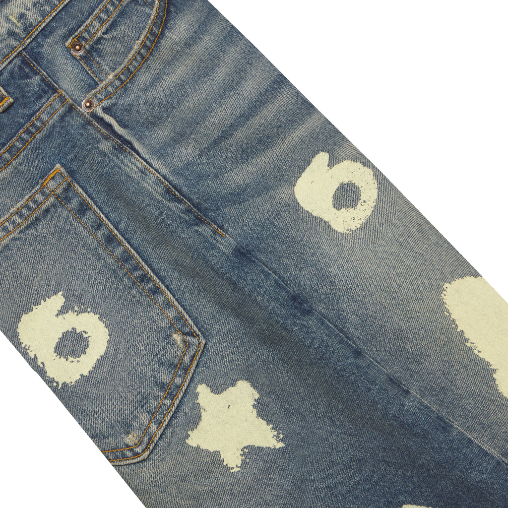 Blue 100% cotton denim shorts with faded Beluga print, belt loops, and five-pocket styling.