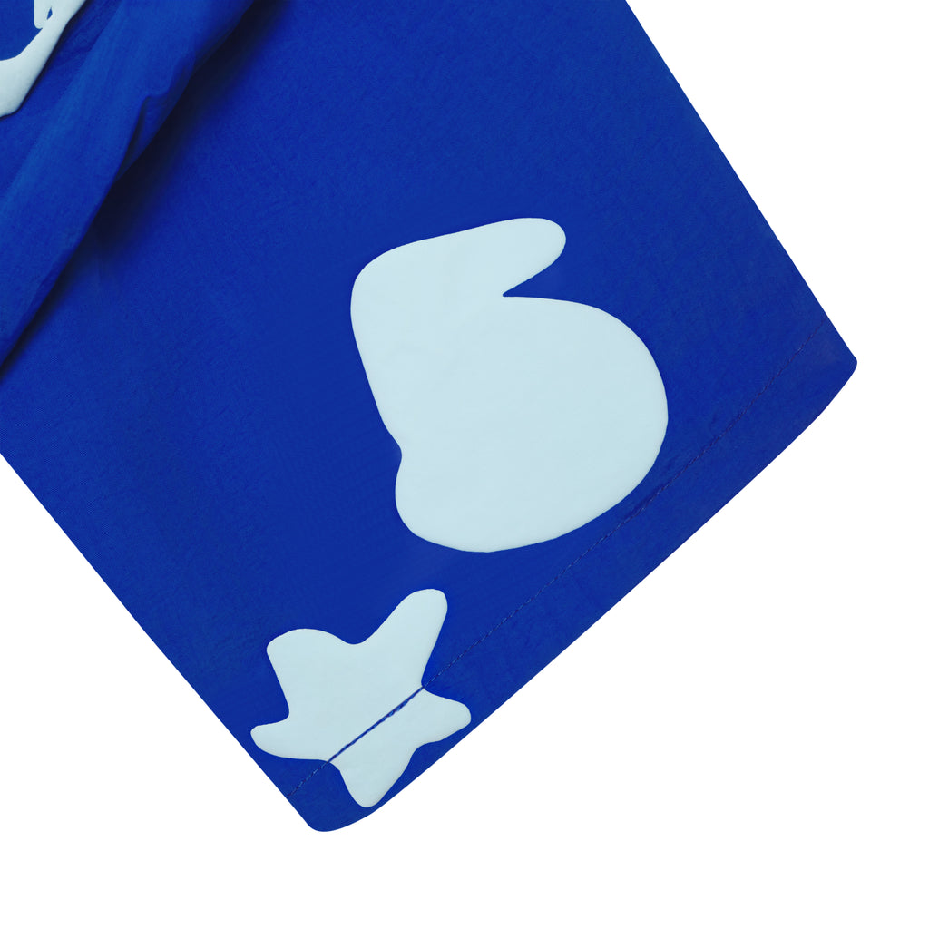 Blue nylon short with white Beluga print, high-low double layer design.