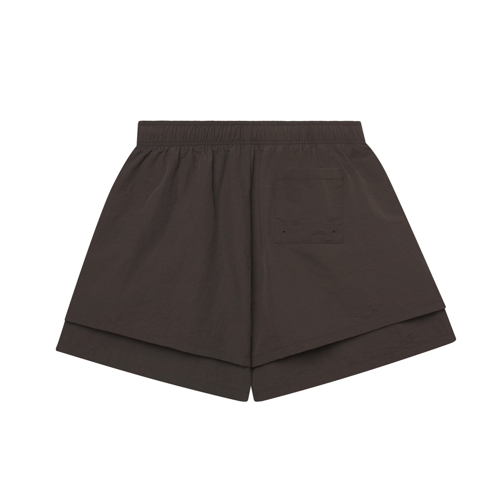 Beluga Double Layer Short in dark brown water-repellent nylon with high-low design and back pocket.
