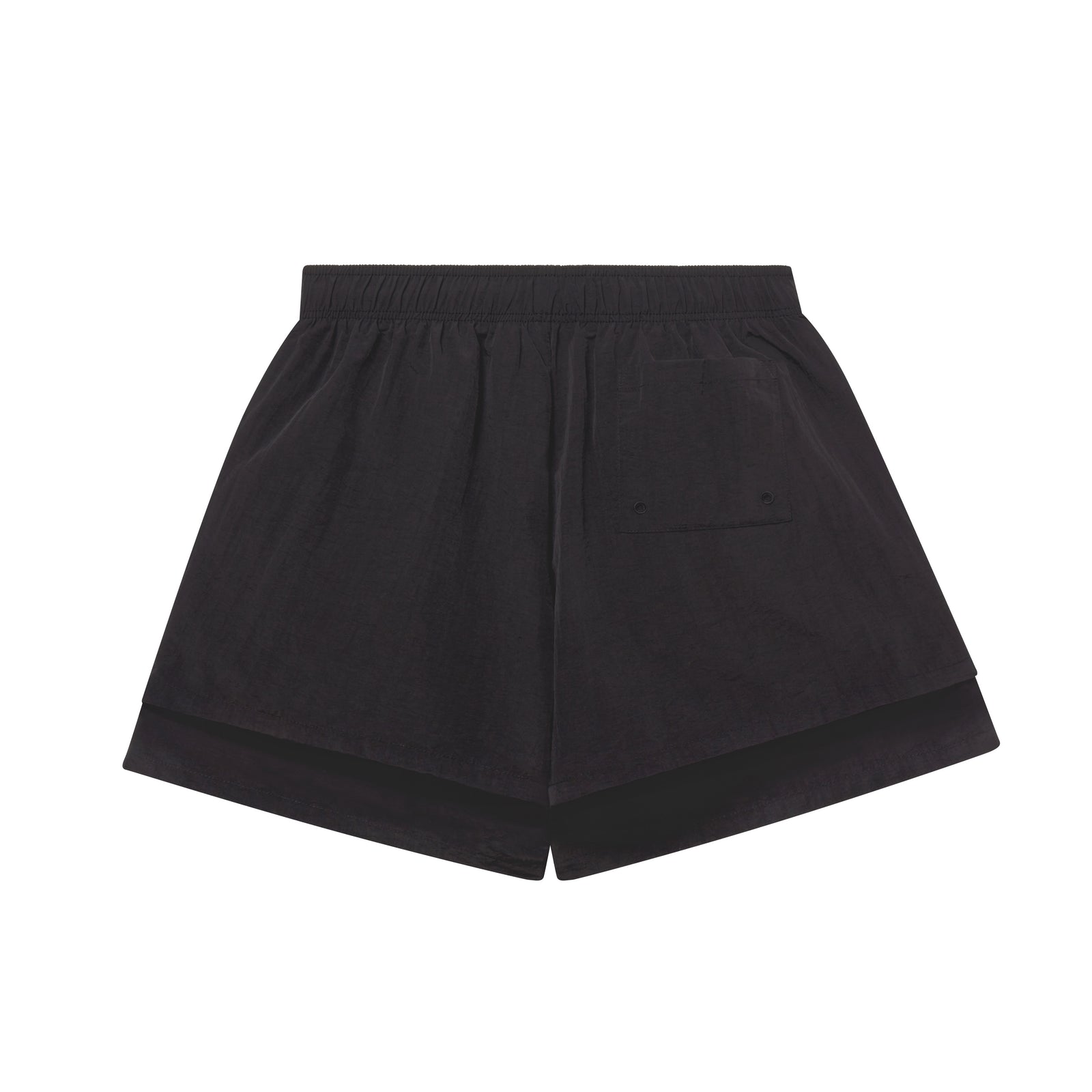Back of Black water-repellent nylon shorts with pink "Sp5der" text, star print, and elastic waistband.