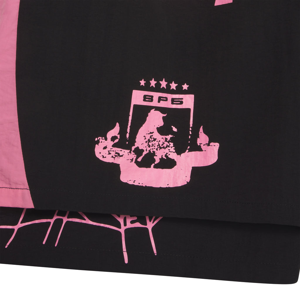 Black 4oz water repellent nylon shorts with pink wide side stripe, graphic print, and web print.