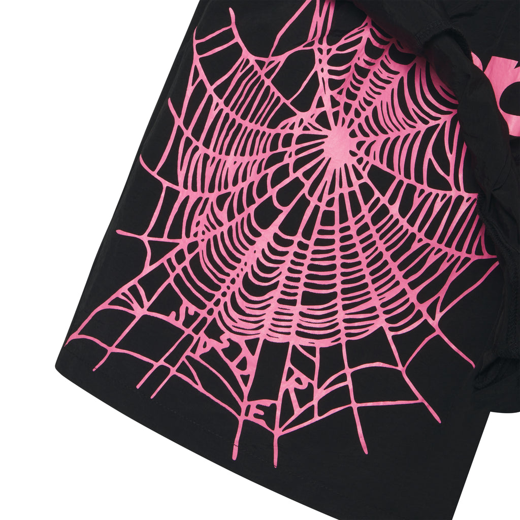 Black double-layer soccer short with a vibrant pink web graphic print on the inner layer.